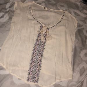 Tilly’s white shirt